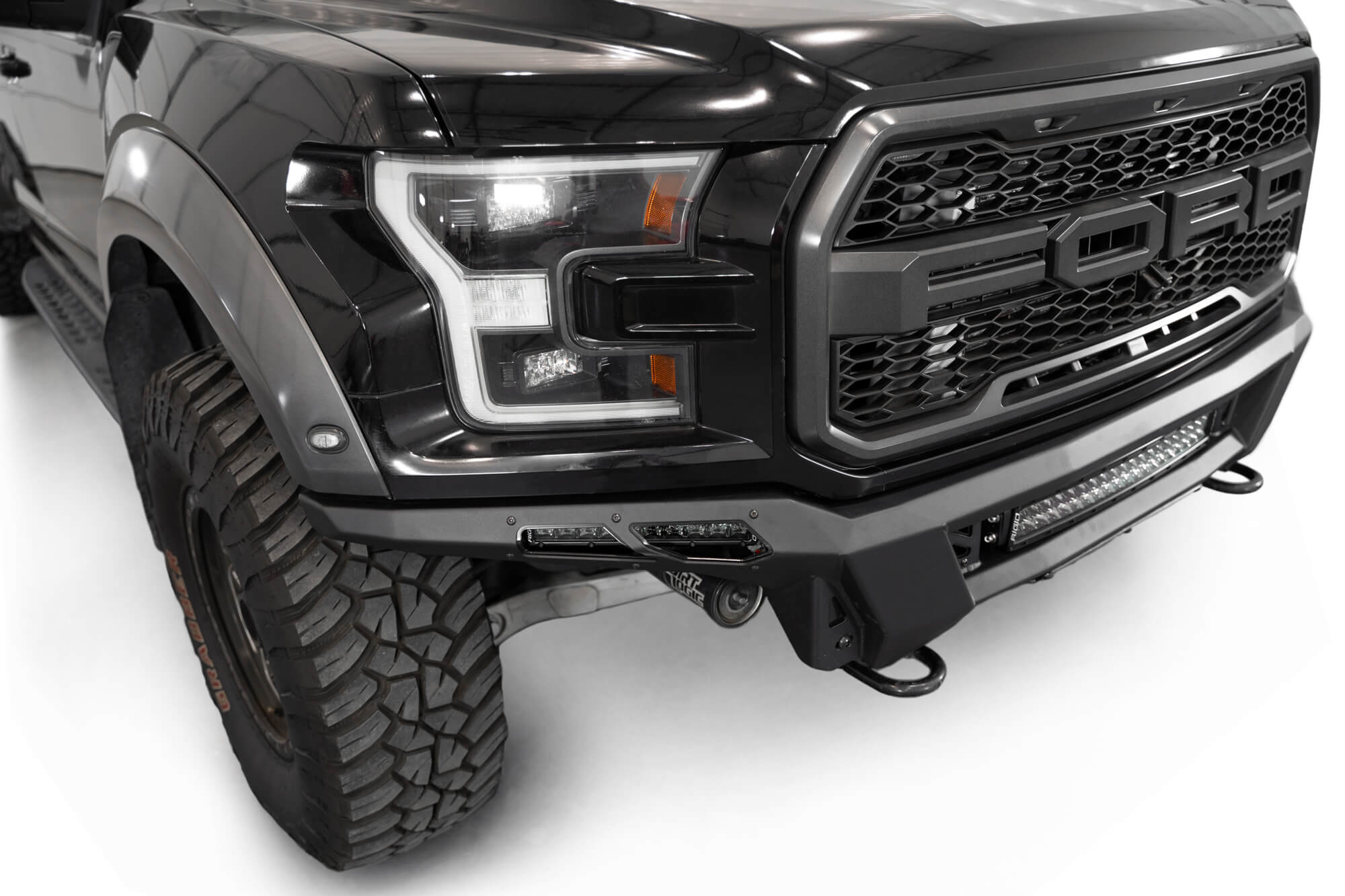 High angle of the 10 inch light bar installed in the 2017-2020 Ford F-150 Raptor Phantom Front Bumper