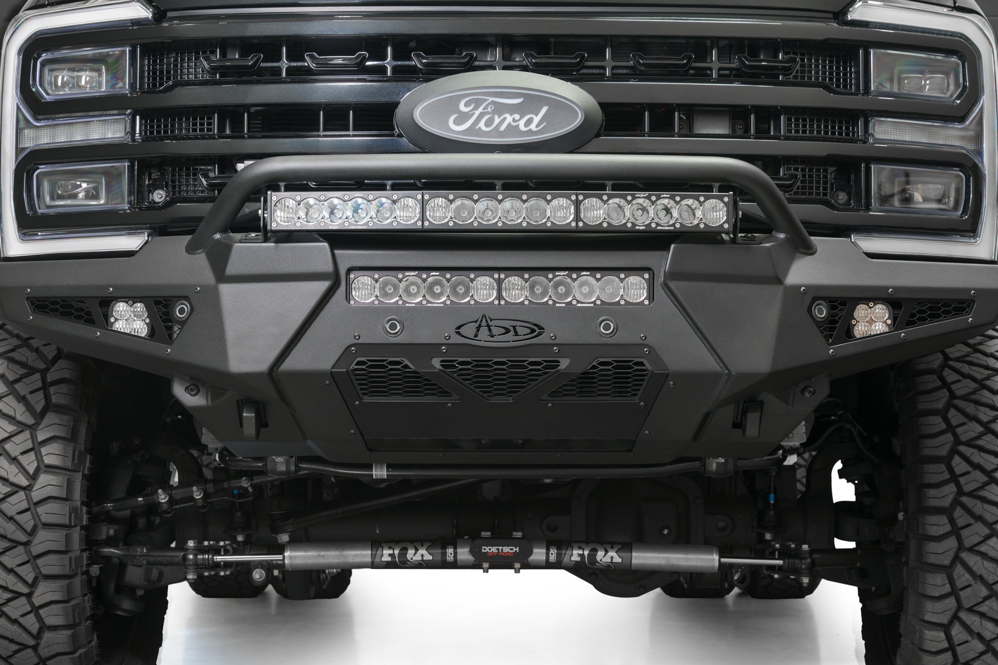 Center Lighting of the HoneyBadger Front Bumper w/ Top Hoop for the 2023-2025 Ford Super Duty