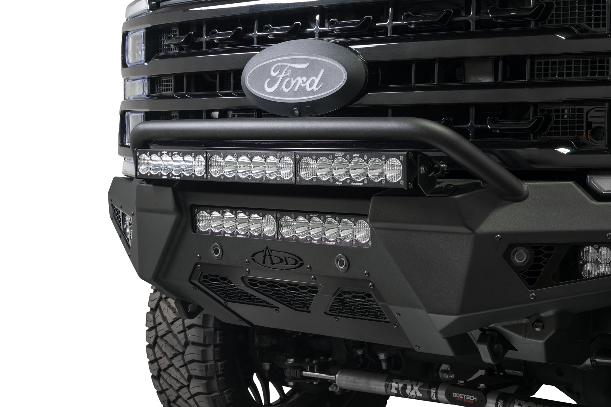 HoneyBadger Front Bumper w/ Top Hoop for the 2023-2025 Ford Super Duty with top hoop center lighting set up.