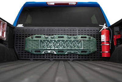 Traction Board mounted to the 2019-2024 Chevy/GMC 1500 Bed Cab Molle Panels