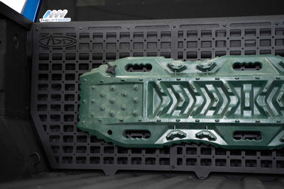 Traction board on the 2019-2024 Chevy/GMC 1500 Bed Cab Molle Panels