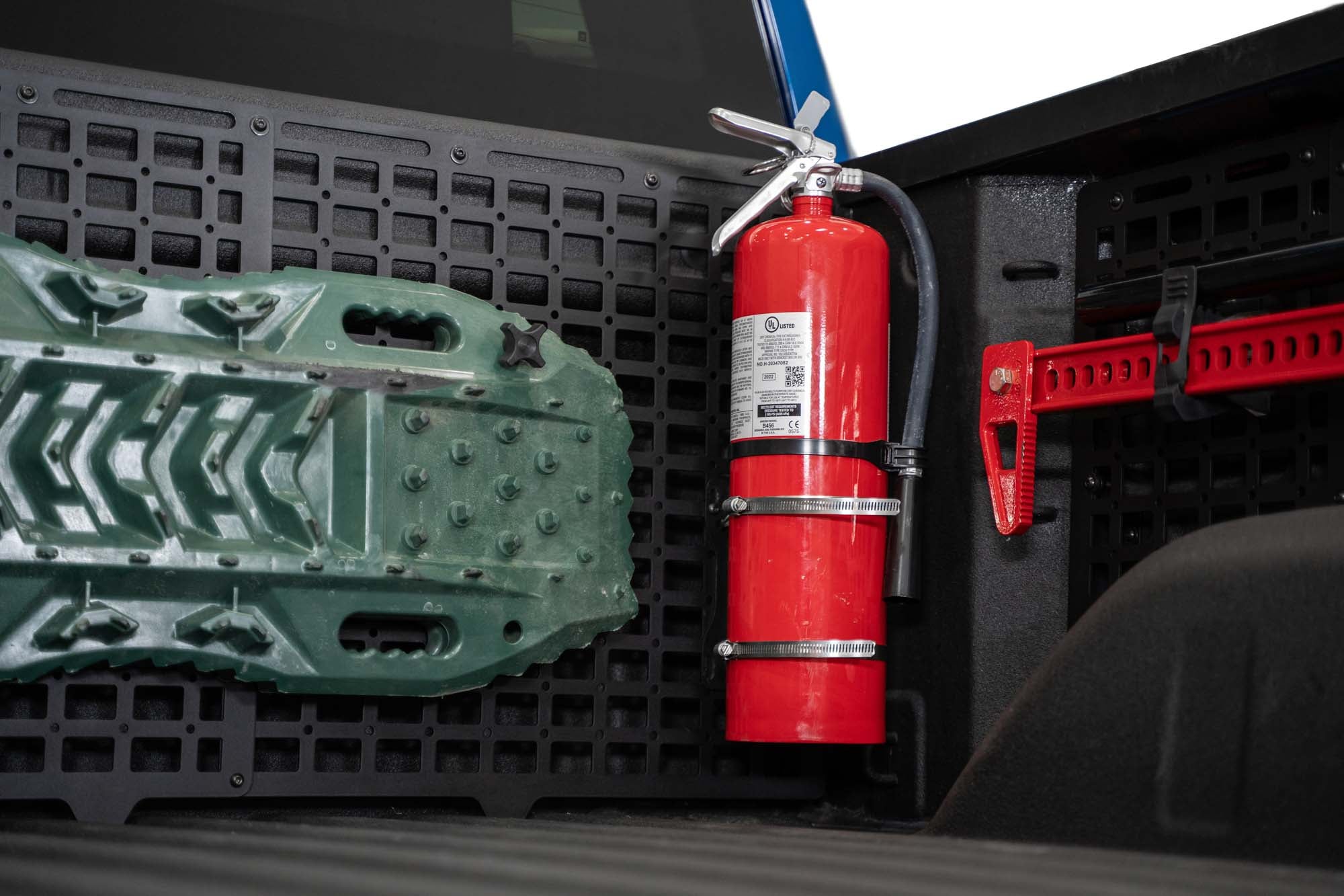 Fire extinguisher on the 2019-2024 Chevy/GMC 1500 Bed Cab Molle Panels
