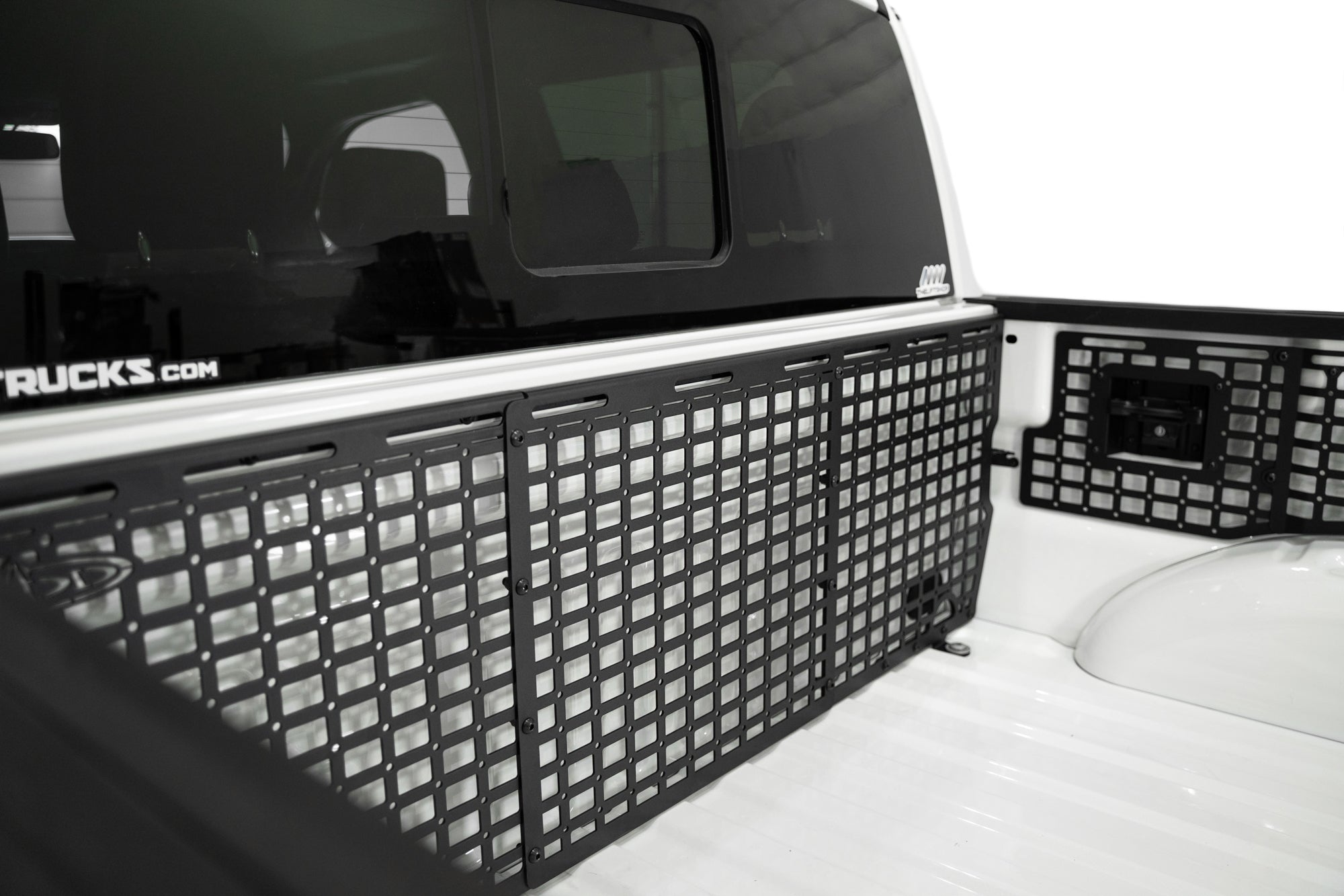Close up of the 2021-2023 Ford F-150 & Raptor Bed Cab Molle Panels