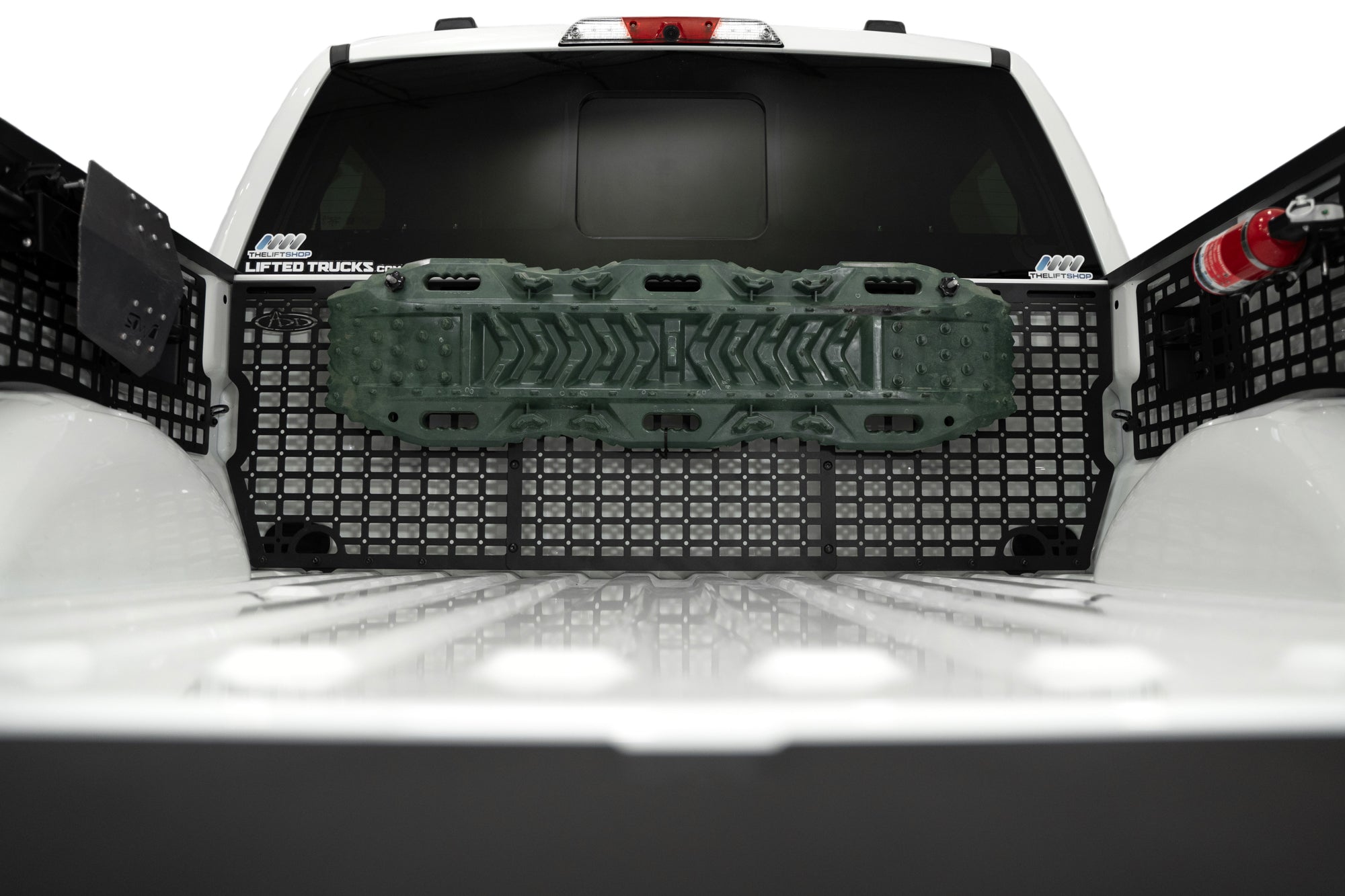 Traction board on the 2021-2023 Ford F-150 & Raptor Bed Cab Molle Panels