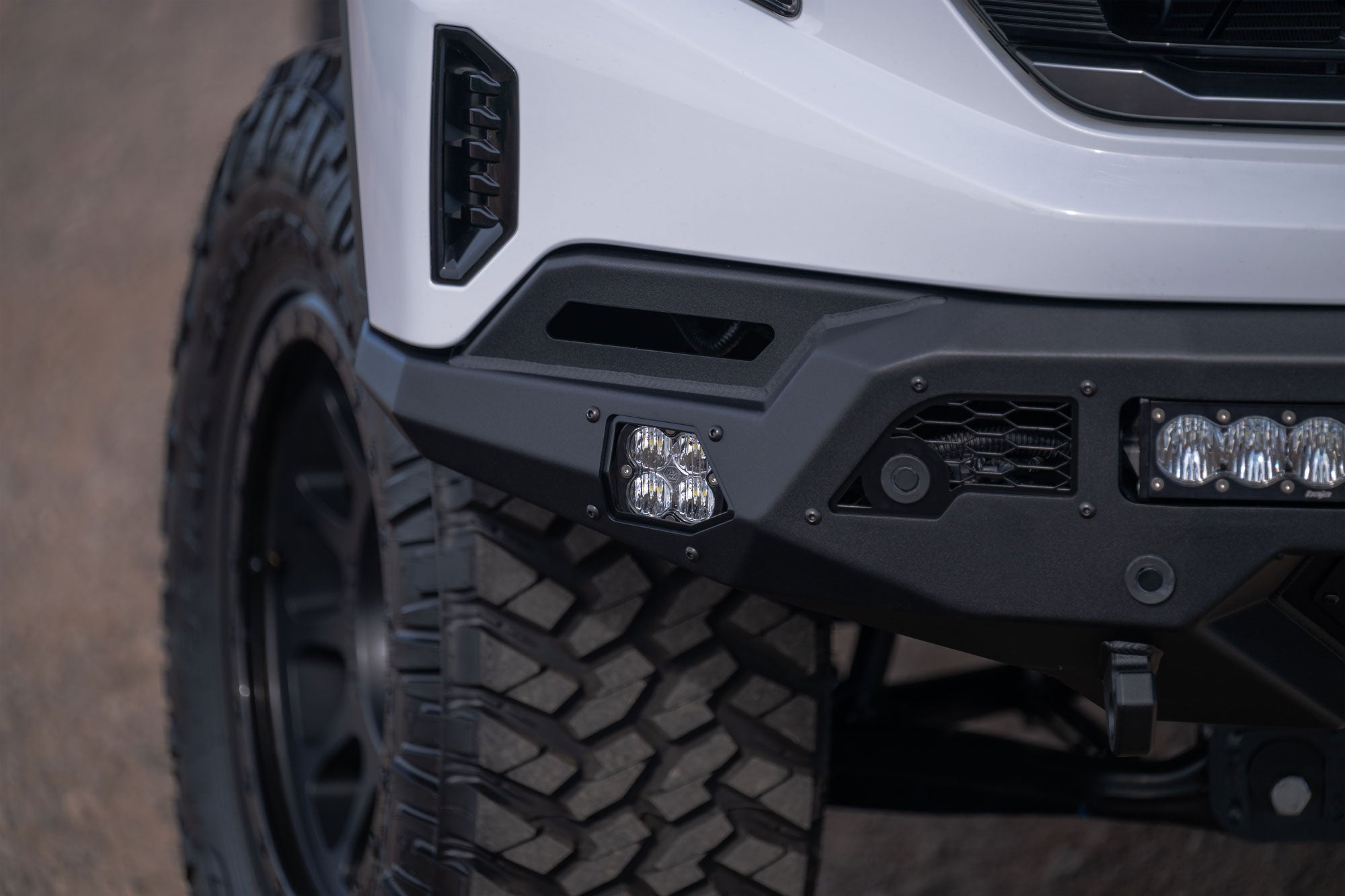 Close up of cube light installed on the GMC Sierra 1500 Stealth Fighter Front Bumper 
