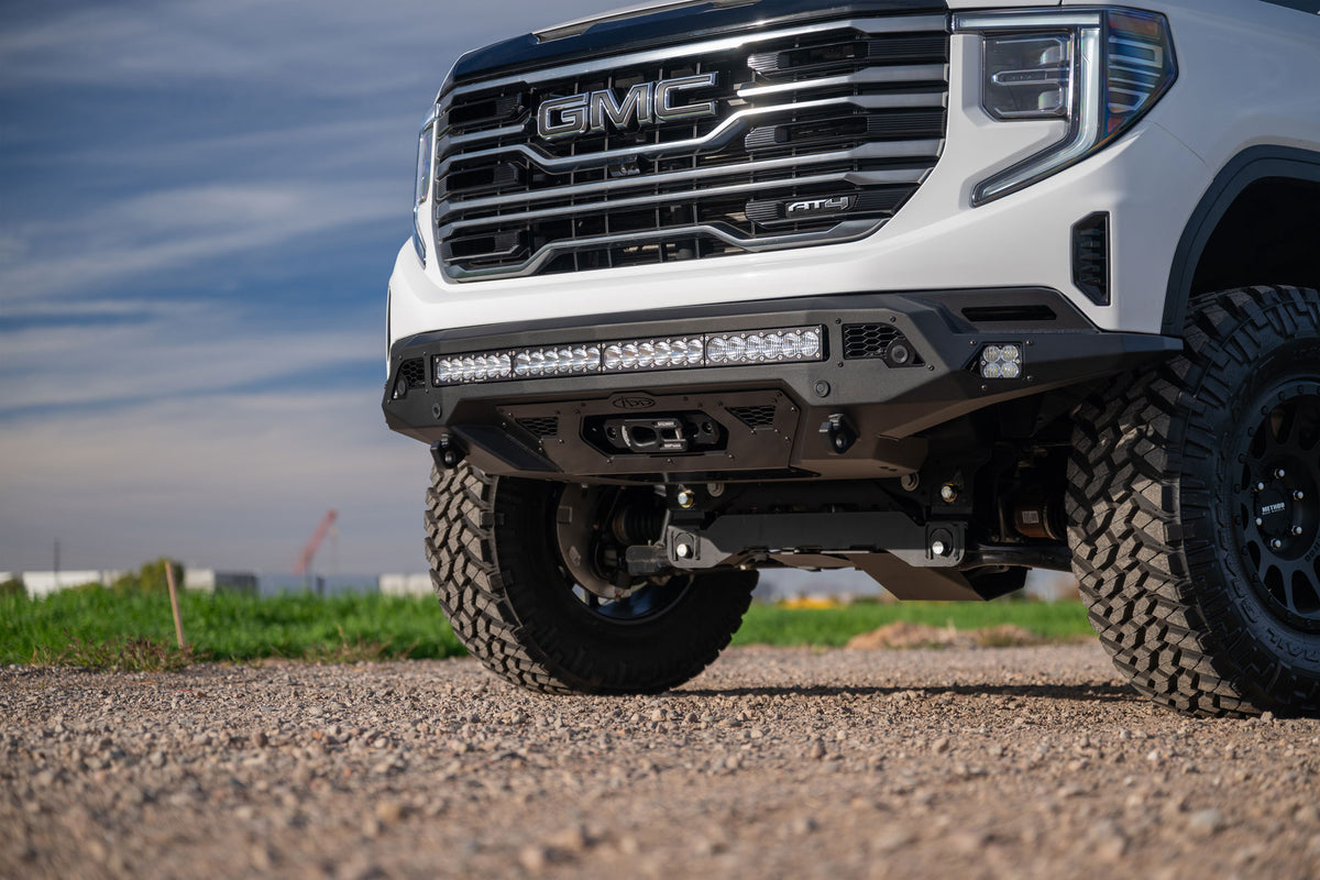 GMC Sierra 1500 with Stealth Fighter Front Bumper and Winch Kit Upgrade and fairlead cutout