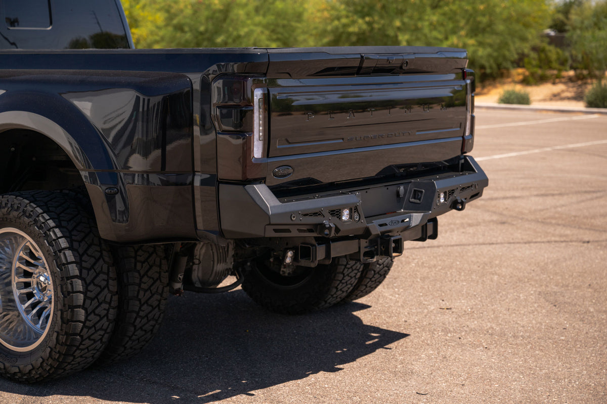 Dually black Ford Super Duty with the  Stealth Fighter Rear Bumper for 2023-2026 Ford Super Duty