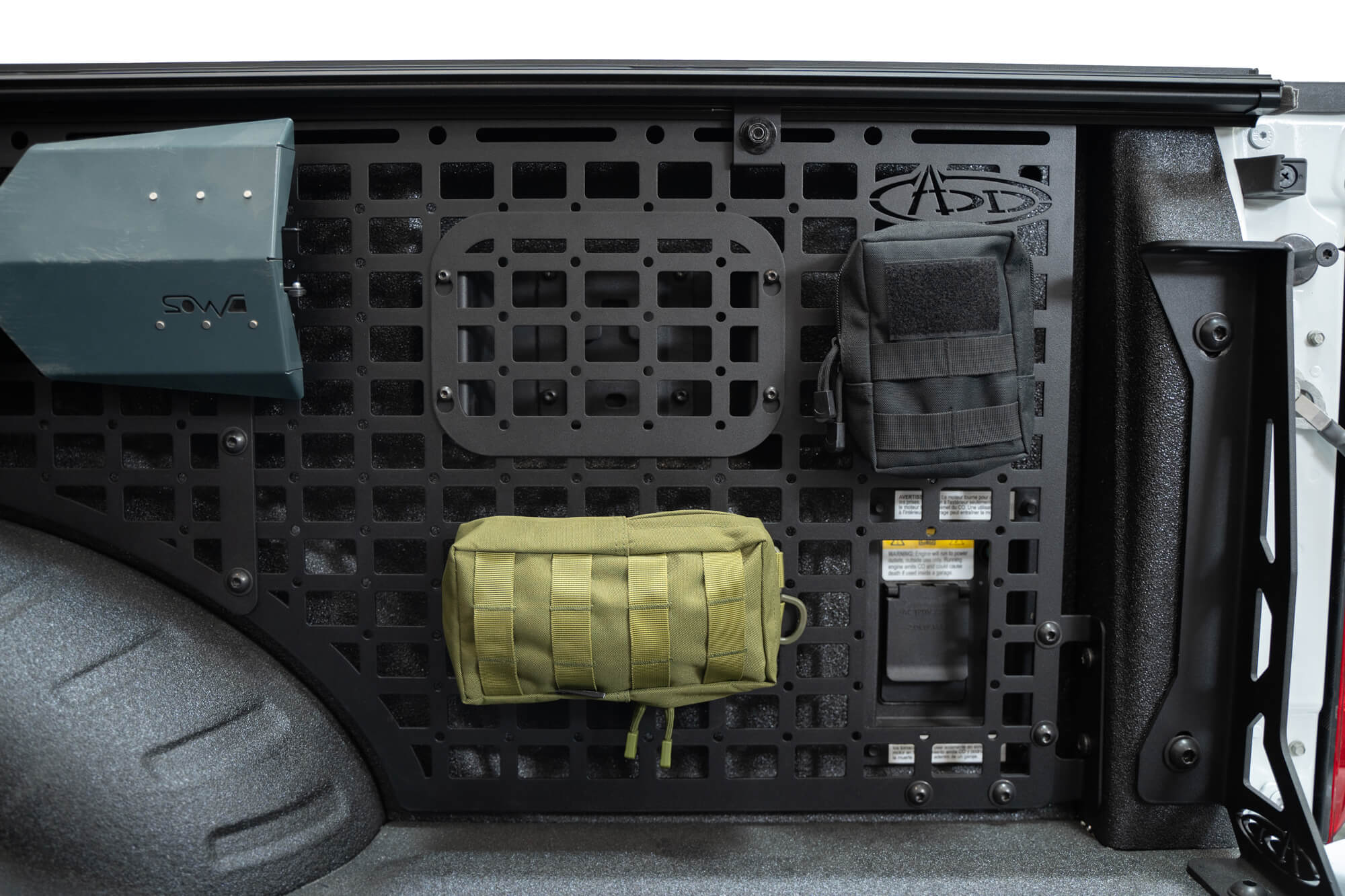 2023 Ford Super Duty Bed Side Molle Panels with items stored and optional covers