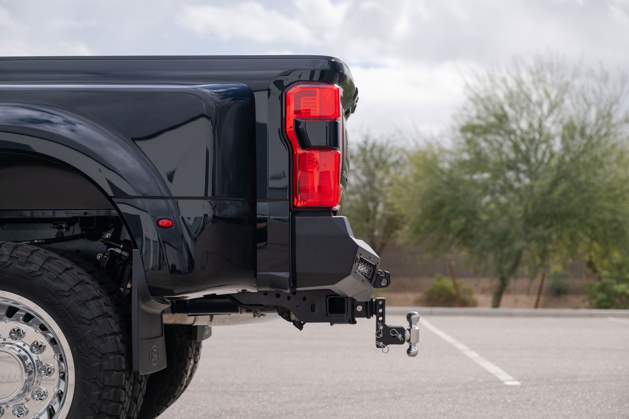 Side profile outside of the 2023+ Ford Super Duty Honeybadger Rear Bumper