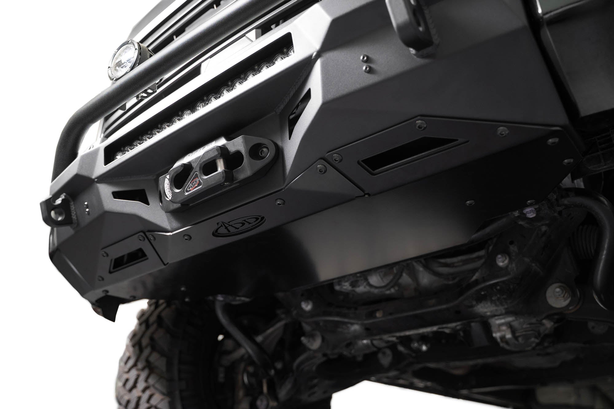 Low angle with Stealth Center Mount Front Bumper w Top Hoop for the 3rd Gen Toyota Tundra skid plate.