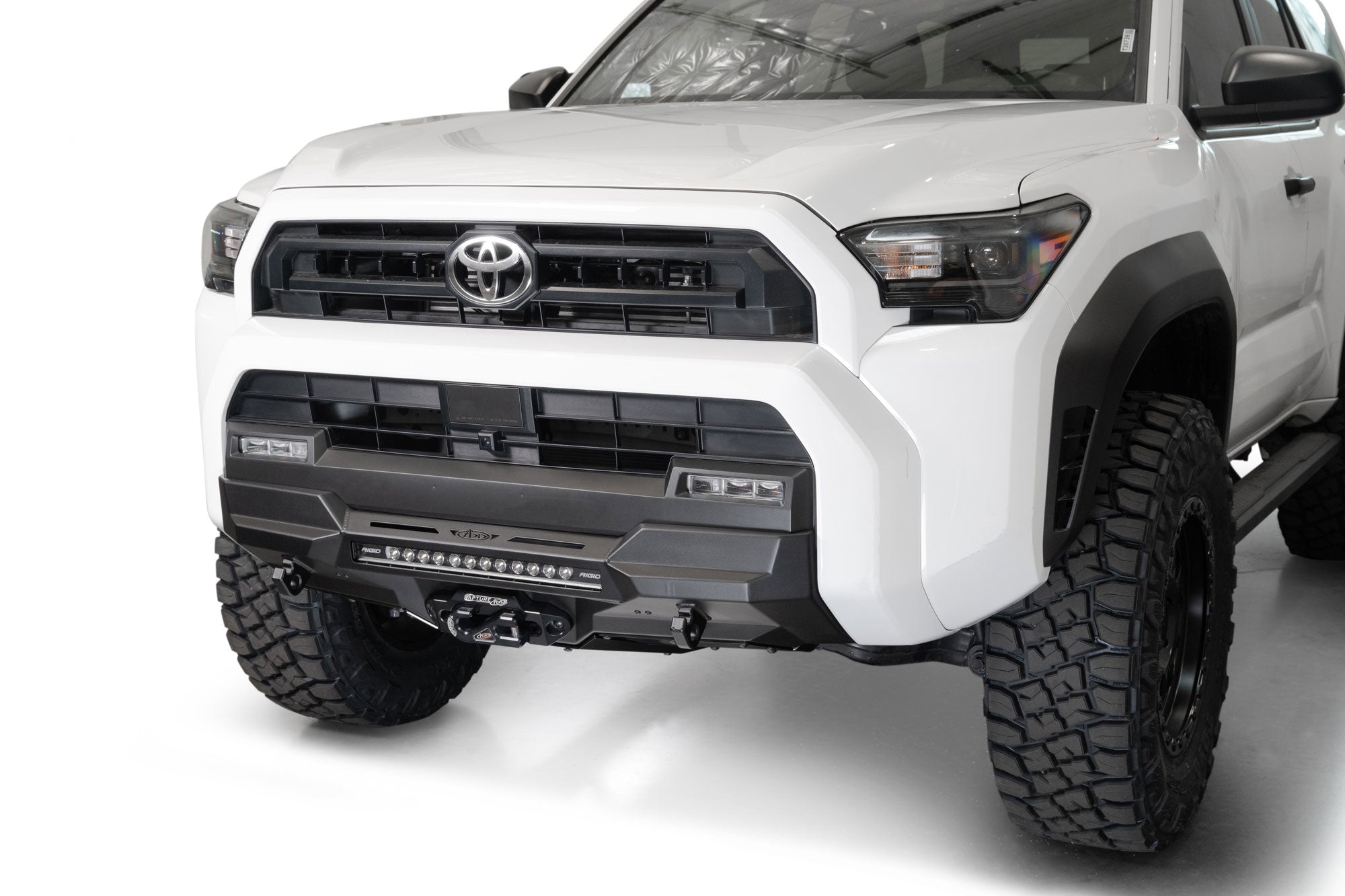 White Toyota 4Runner with 2025 Toyota 4Runner Stealth Center Mount Front Bumper on a white background