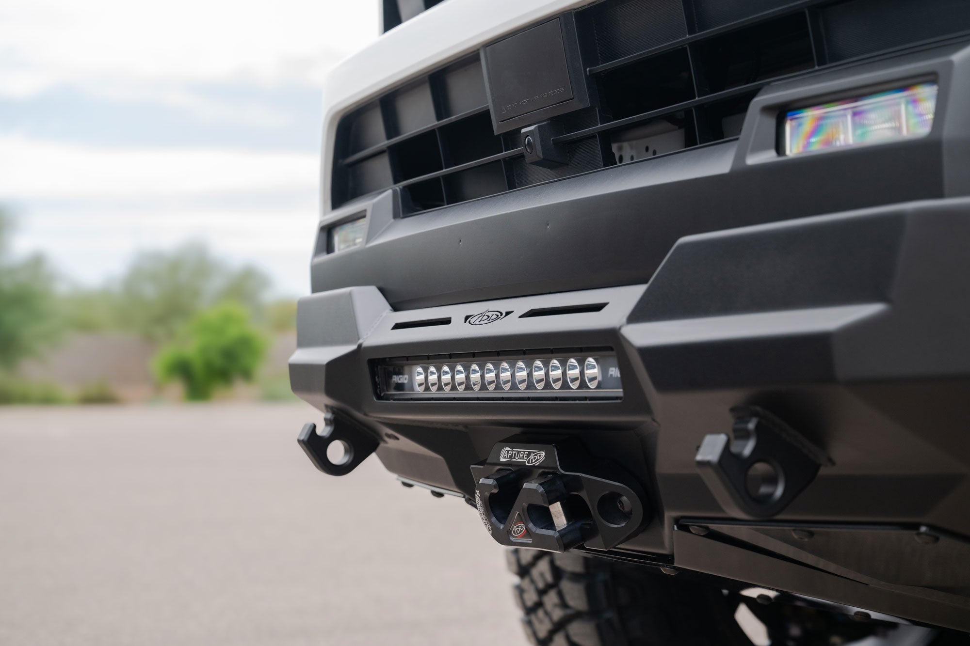 2025 Toyota 4Runner Stealth Center Mount Front Bumper Corner Profile on cloudy day