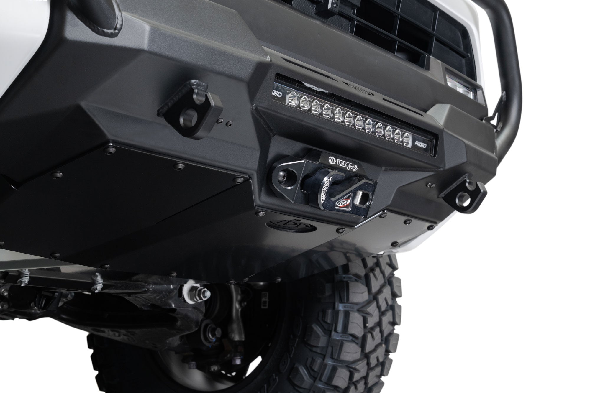 Close-up of a 2025 Toyota 4Runner Stealth Center Mount Front Bumper with Top Hoop with off-road lights on a white background