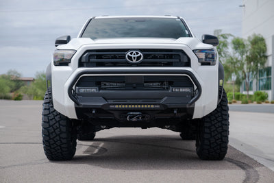2025 Toyota 4Runner Stealth Center Mount Front Bumper with Top Hoop on a paved road.