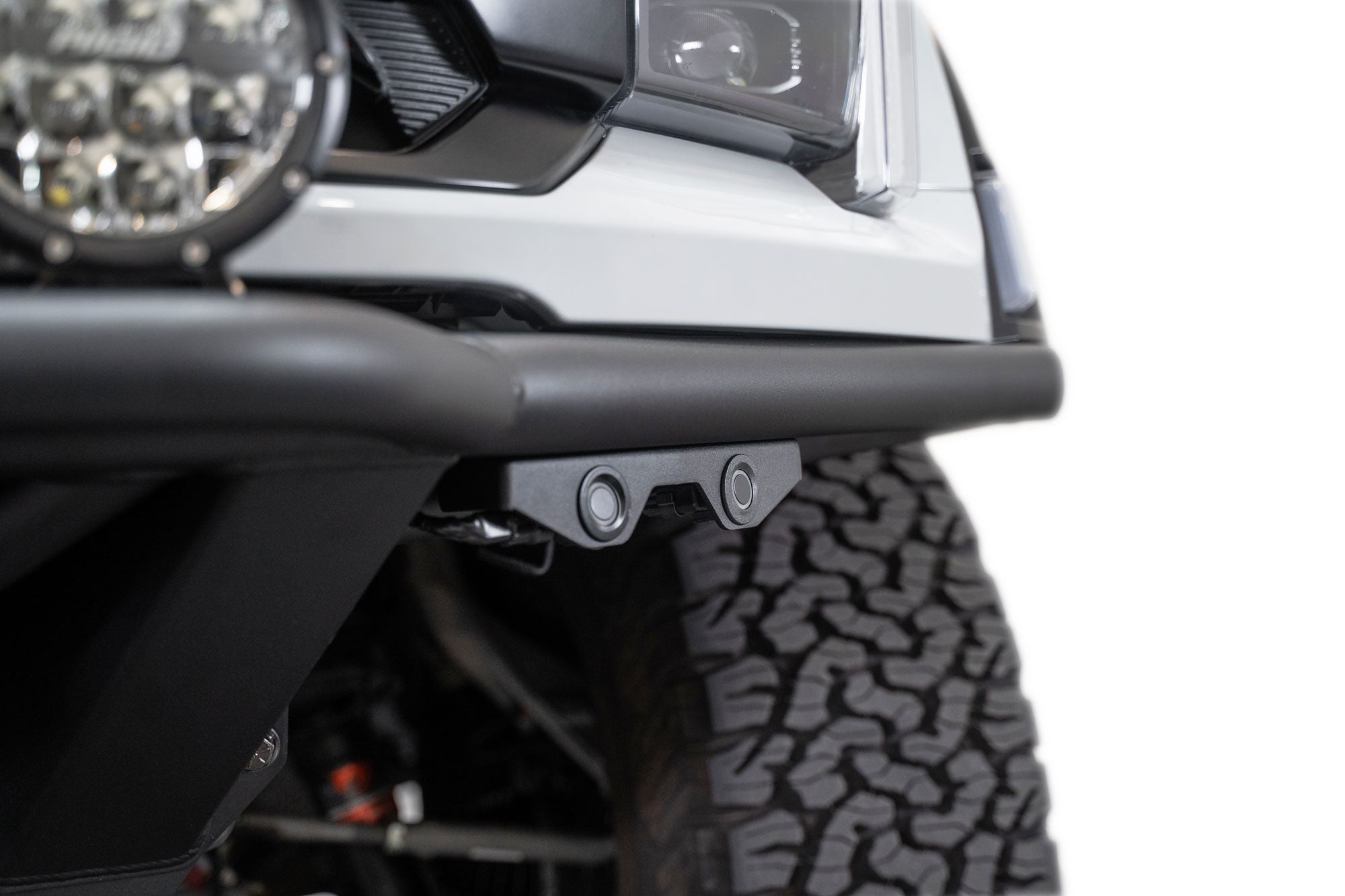 Close front view of installed mounted with focus on OEM sensors integrated