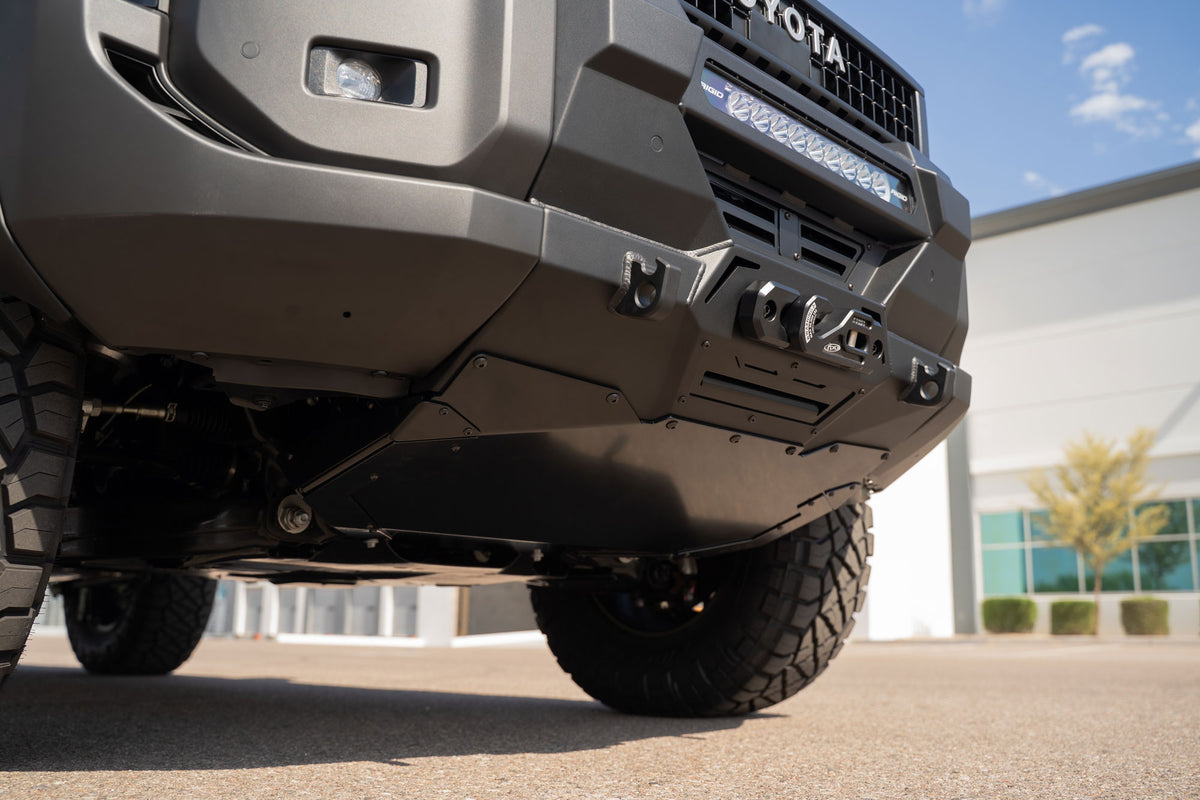 Close up shot of installed skid plate option with the Toyota Land Cruiser Stealth Center Mount Winch Front Bumper for 2024 and newer vehicles