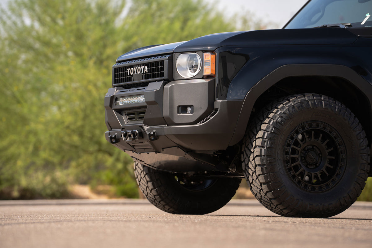 Parked Toyota Land Cruiser Stealth Center Mount Winch Front Bumper for 2024+ vehicles installed with skid plate option 