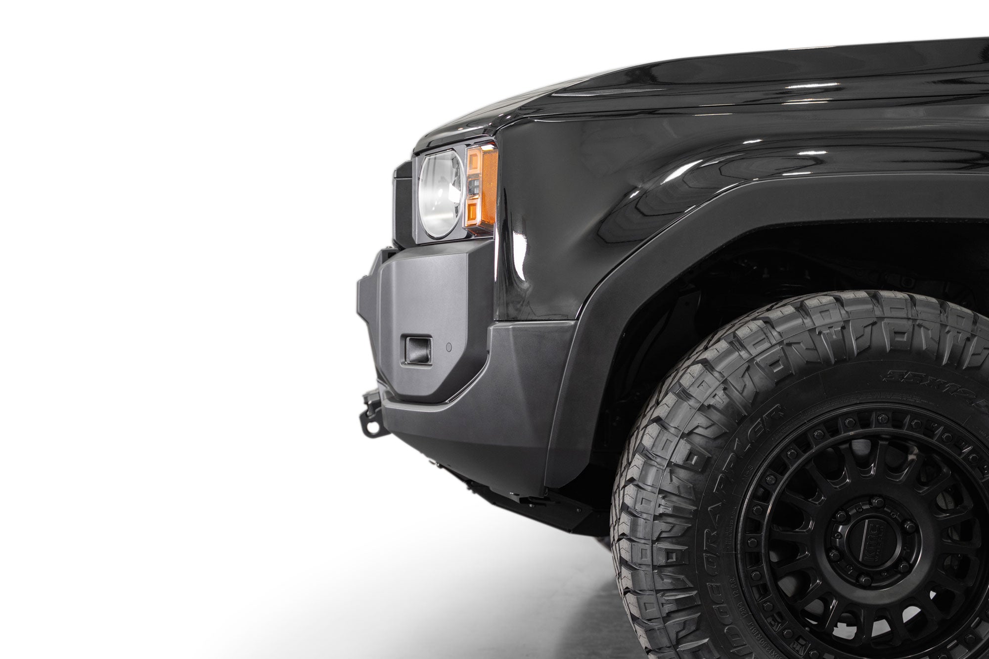 Side profile view of Toyota Land Cruiser Stealth Center Mount Winch Front Bumper for 2024 and newer vehicles