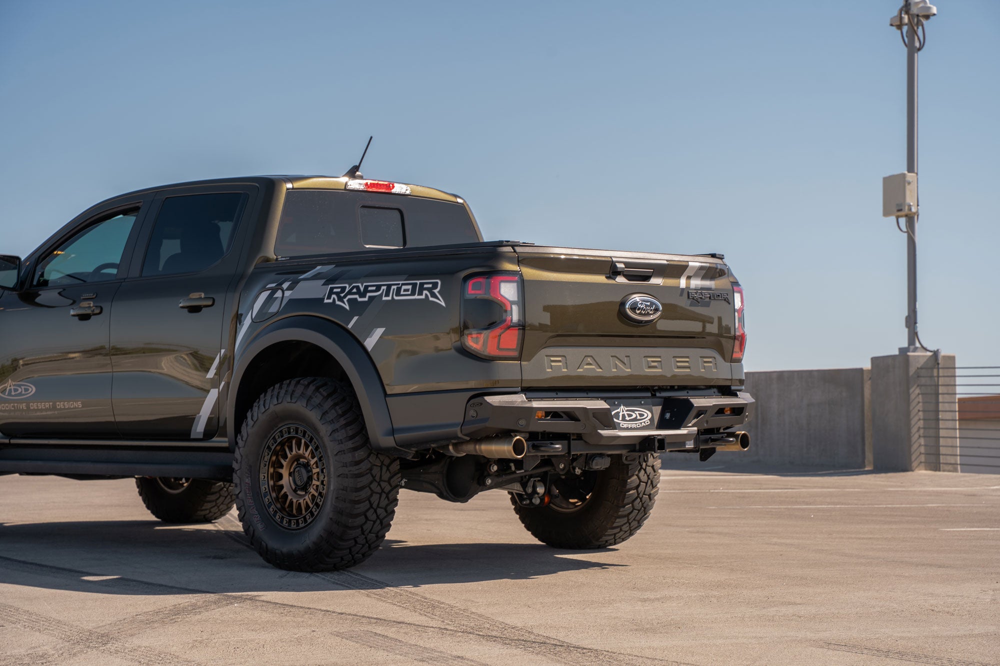 Parking lot sunlight photo of the ADD Edge Rear Bumper for the Ford Ranger Raptor