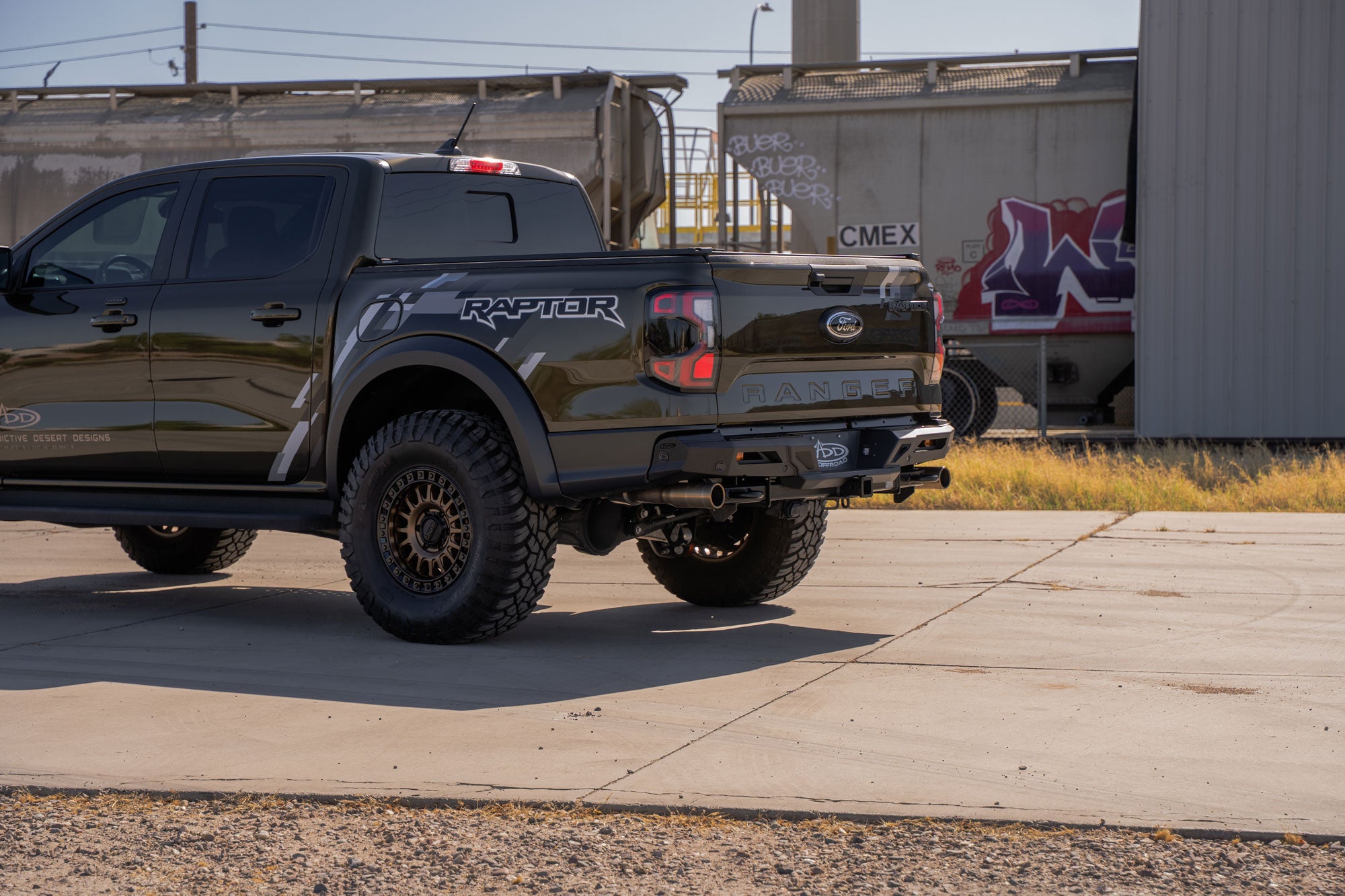 ADD Edge Rear Bumper for the Ford Ranger Raptor, photographed in an industrial lot.