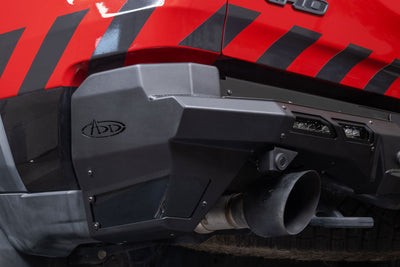 Corner angle of the 2025 Ram RHO Phantom Rear Bumper with blind spot monitors and parking sensors retained.