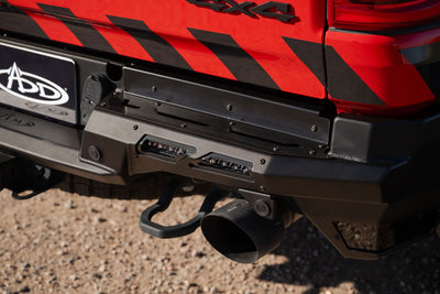 Satin black steps and accent panels on the Phantom Rear Bumper for RAM RHO