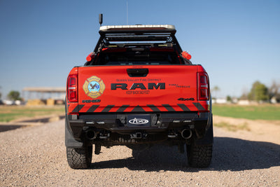 Dirt road setting with a Phantom Rear Bumper installed on the 2025 Ram RHO