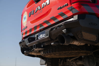 Low angle shot of the Phantom Rear Bumper on the RAM RHO highlighting the fitment of said bumper.